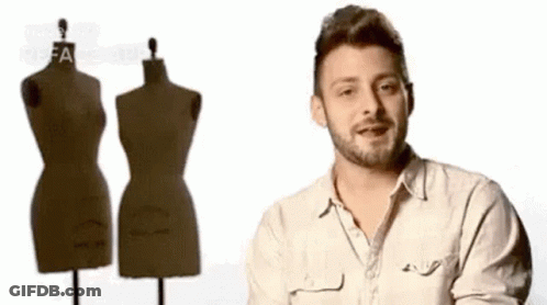 Man With Beard In Front Of Mannequin GIF