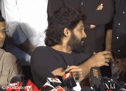 Man With Beard In Front Of Microphones Saying Aqua GIF