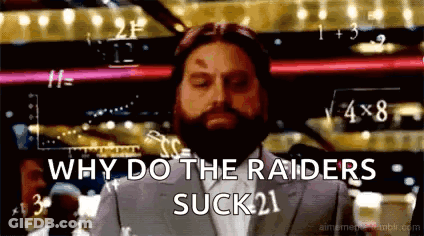 Man With Beard In Front Of Screen Saying Why Do The Raiders Suck GIF