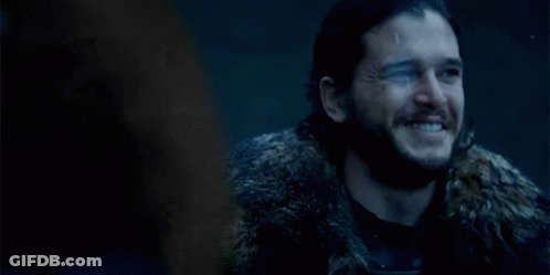 Man With Beard In Fur Coat Smiling Close Up GIF
