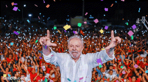 Man With Beard In Green And Yellow Sash GIF