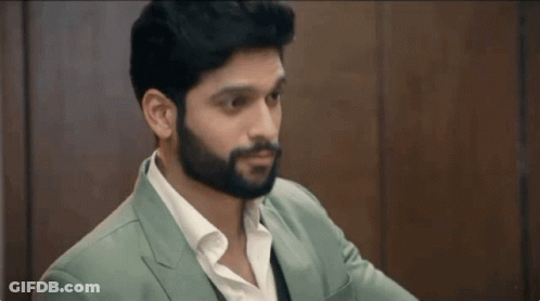 Man With Beard In Green Suit And White Shirt GIF