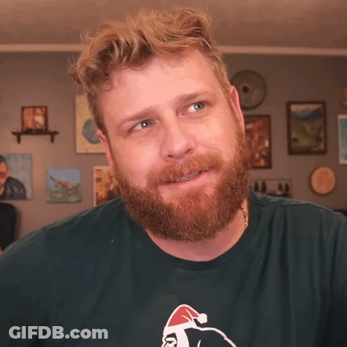 Man With Beard In Green T-Shirt With Santa GIF