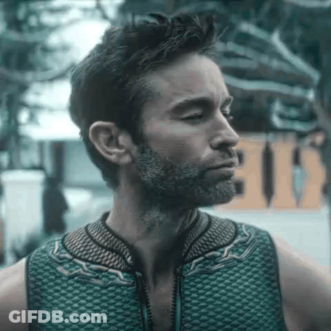 Man With Beard In Green Vest GIF