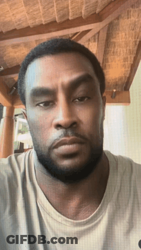 Man With Beard In Grey Shirt GIF