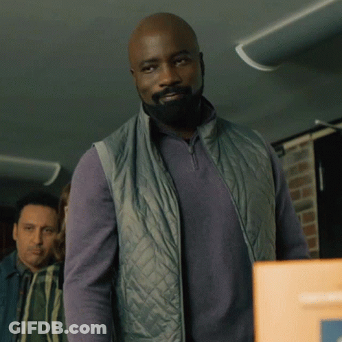 Man With Beard In Grey Vest GIF