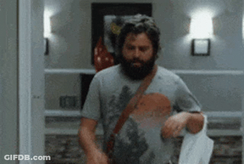 Man With Beard In Hallway GIF