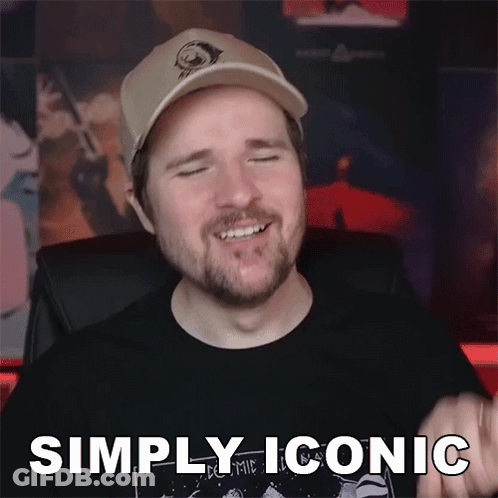 Man With Beard In Hat And Black Shirt Says Simply Iconic GIF