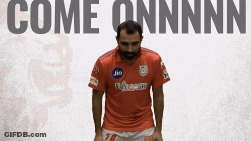 Man With Beard In Orange Jersey Saying Jio GIF