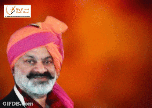 Man With Beard In Pink Turban Under Facebook Logo GIF