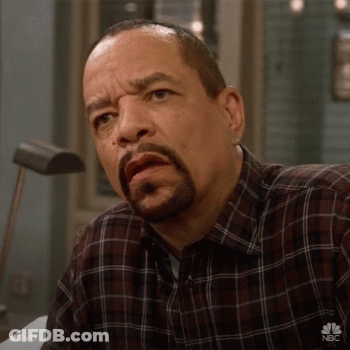 Man With Beard In Plaid Shirt With NBC Logo GIF