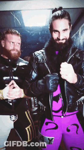 Man With Beard In Purple Pants With Question Mark GIF