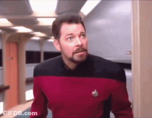 Man With Beard In Red And Black Uniform GIF