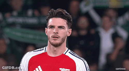 Man With Beard In Red And White Soccer Uniform GIF