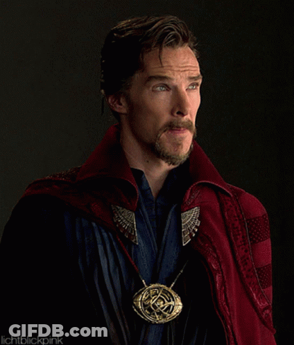 Man With Beard In Red Cape And Gold Pendant GIF