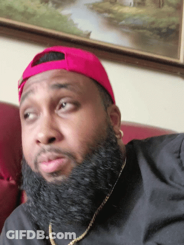 Man With Beard In Red Hat And Gold Chain GIF