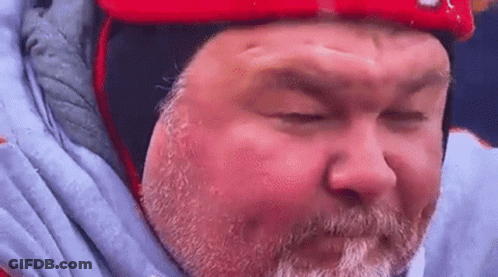 Man With Beard In Red Helmet And Blue Jacket GIF