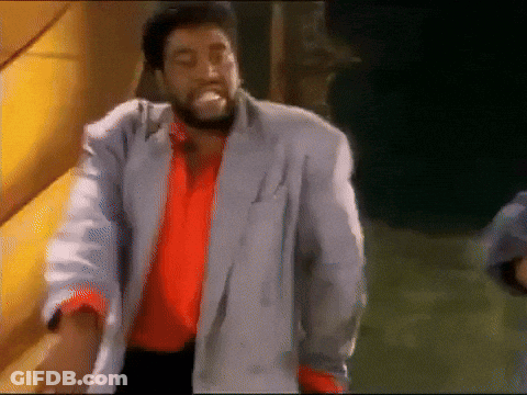 Man With Beard In Red Shirt And Grey Jacket GIF