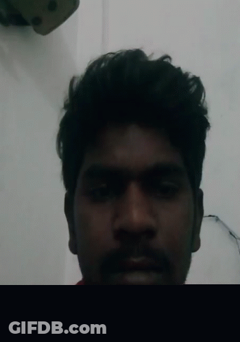 Man With Beard In Red Shirt And Necklace GIF