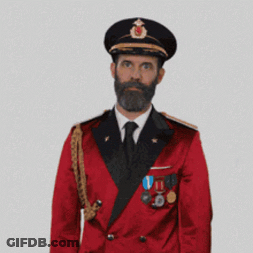 Man With Beard In Red Suit And Black Hat GIF