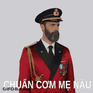 Man With Beard In Red Uniform Chuan Com Me Nau GIF