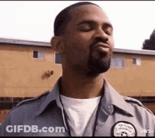 Man With Beard In Security Uniform GIF