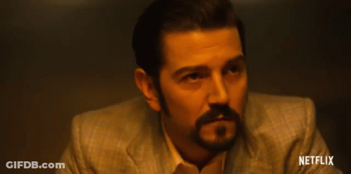 Man With Beard In Suit And Netflix Logo GIF