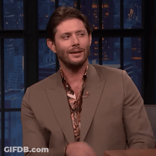 Man With Beard In Suit And Scarf GIF