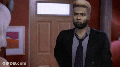 Man With Beard In Suit And Tie At Door GIF
