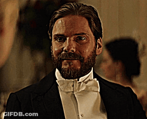 Man With Beard In Suit And Tie Looking Out Window GIF
