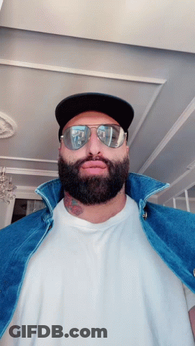 Man With Beard In Sunglasses And Baseball Cap GIF