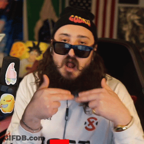 Man With Beard In Sunglasses And Gorilla Hat GIF