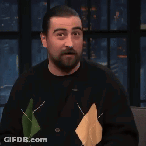 Man With Beard In Tan Jacket And White T-Shirt GIF
