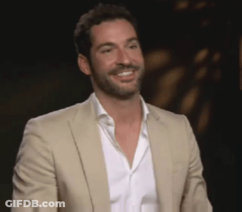 Man With Beard In Tan Suit And White Shirt GIF