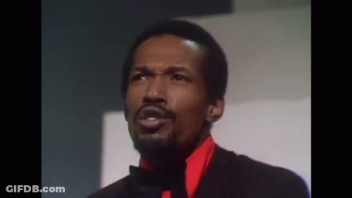 Man With Beard In Tuxedo And Red Shirt GIF