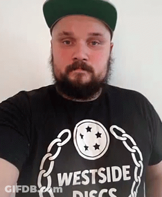 Man With Beard In Westside Discs T-Shirt GIF