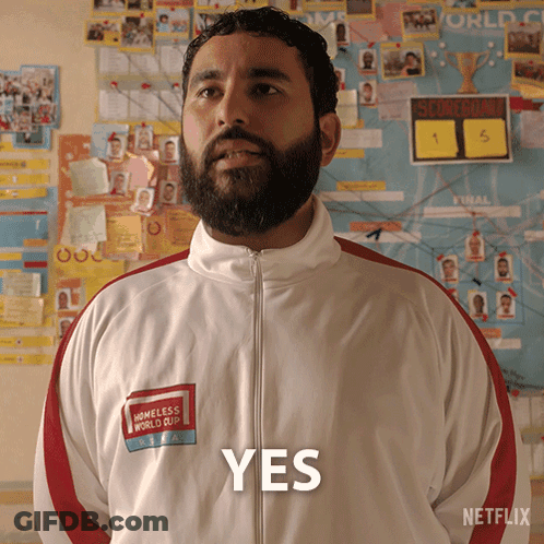 Man With Beard In White Jacket Saying Yes GIF