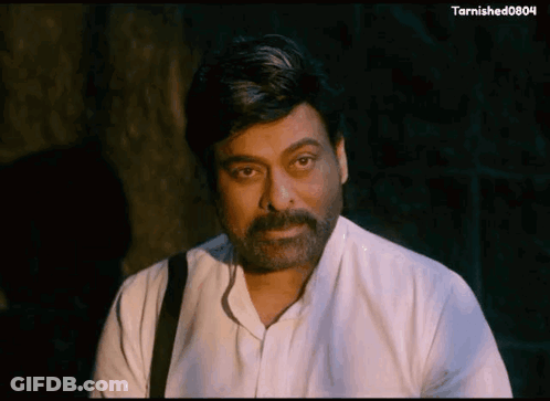 Man With Beard In White Shirt And Black Strap GIF