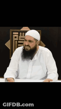 Man With Beard In White Shirt And Hat GIF