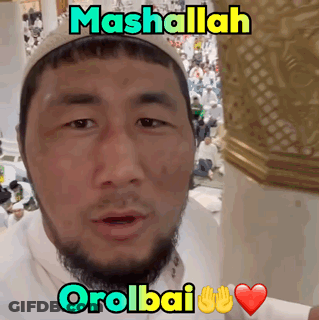 Man With Beard In White Shirt And Hat Says Mashallah Orolbai GIF