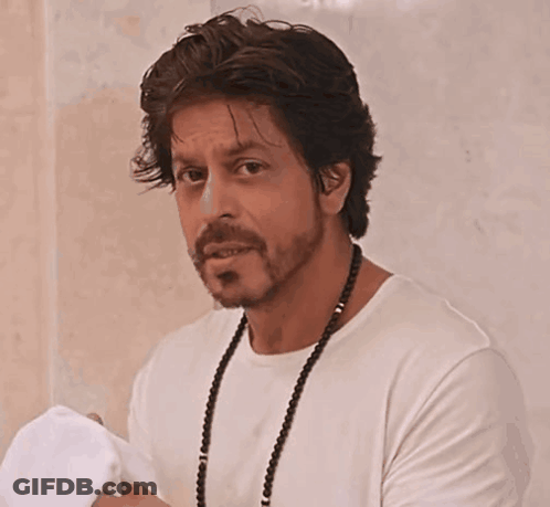 Man With Beard In White Shirt And Necklace GIF