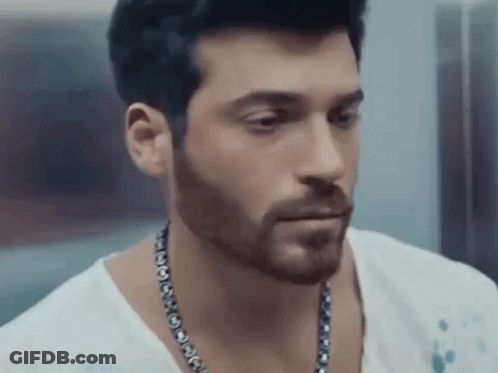 Man With Beard In White Shirt And Necklace GIF