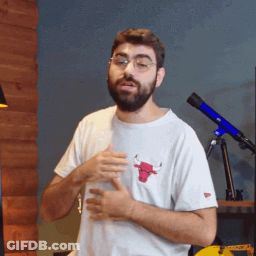 Man With Beard In White Shirt With Bull GIF