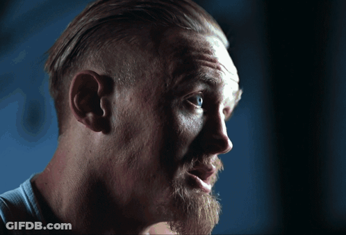 Man With Beard In White Tank Top Smiling GIF