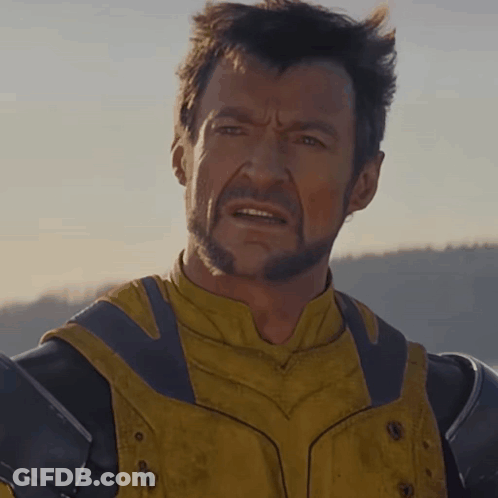 Man With Beard In Yellow And Black Suit GIF
