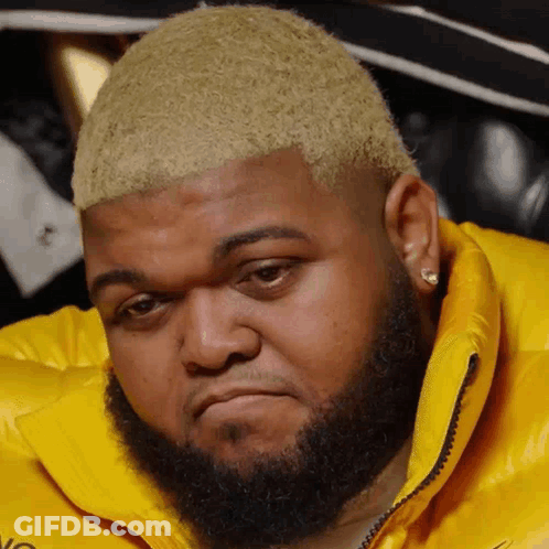 Man With Beard In Yellow Jacket GIF