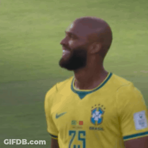 Man With Beard In Yellow Jersey Number 25 GIF