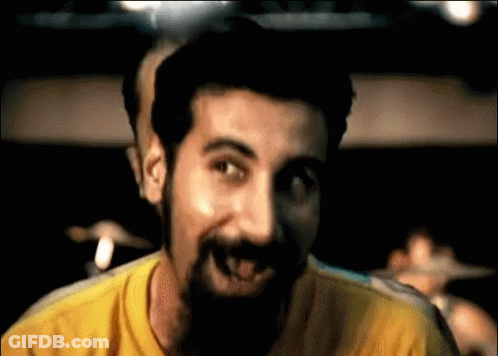 Man With Beard In Yellow Shirt GIF