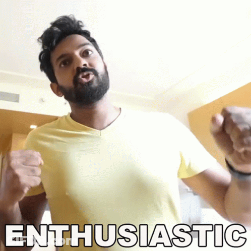 Man With Beard In Yellow Shirt Saying Enthusiastic GIF