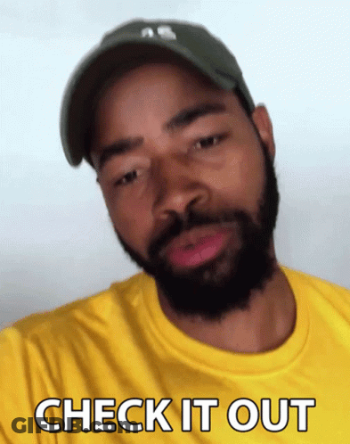 Man With Beard In Yellow Shirt Says Check It Out GIF
